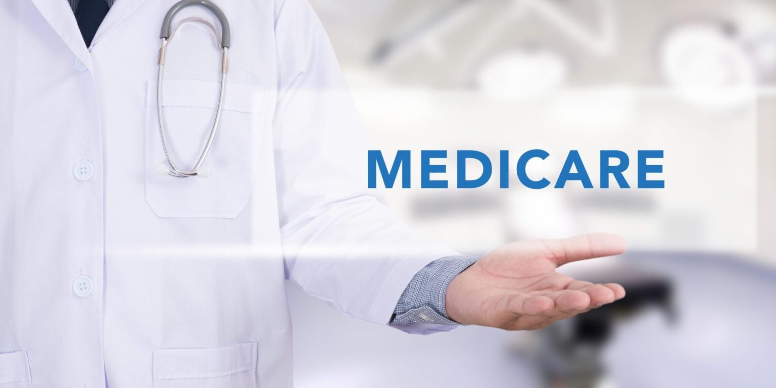 Health concept - MEDICARE on Medical Doctor holding hands